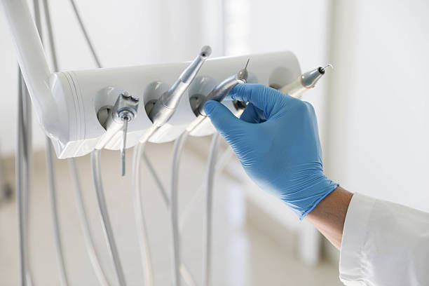 Professional Invisalign Clear Aligners technician working in Elmo, TX